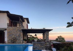 The swimming pool at or close to Akrolithos Villa, Milies Pelion