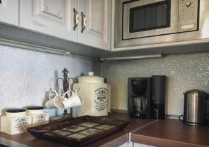 A kitchen or kitchenette at Akrolithos Villa, Milies Pelion