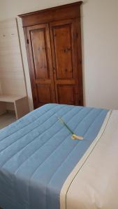 Cecio 5 Terre Rooms tesisinde bir odada yatak veya yataklar