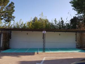 Tenis a/nebo squash v ubytování Golfe Hôtel & Spa Porto-Vecchio nebo okolí