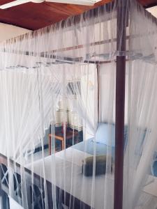 Postel nebo postele na pokoji v ubytování The Breeze Mirissa