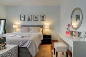 Postel nebo postele na pokoji v ubytování Adriatic Apartments