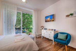 Postel nebo postele na pokoji v ubytování Adriatic Apartments