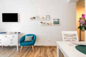 TV a/nebo společenská místnost v ubytování Adriatic Apartments