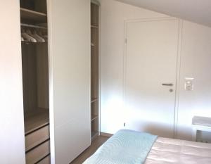 Postel nebo postele na pokoji v ubytování Appartement Kohlnberger + 26 fotografií