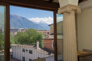 a view from a balcony with a view of mountains at B&B Ponte Capograssi in Sulmona