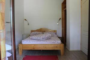 Postel nebo postele na pokoji v ubytování Guest House 3M
