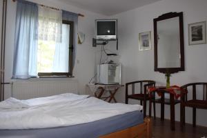 Postel nebo postele na pokoji v ubytování Guest House 3M
