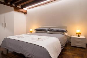 Postel nebo postele na pokoji v ubytování La Felice Canal Grande