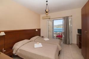 Postel nebo postele na pokoji v ubytování Hotel El Greco