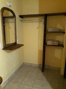 Palanda nebo palandy na pokoji v ubytování Hotel Villa Aurora
