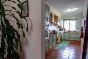 Majoituspaikan Casa dos Rui´s keittiö tai keittotila