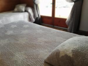 Postel nebo postele na pokoji v ubytování Hostal Santa Clara