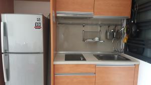 Η κουζίνα ή μικρή κουζίνα στο Austin Palazio Apartment