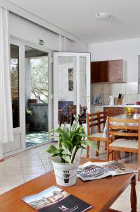 Φωτογραφία από το άλμπουμ του apartmani Novotny plavi σε Banjol