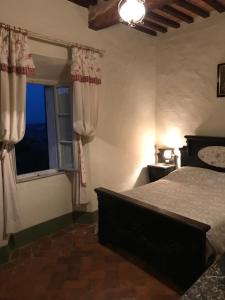 Letto o letti in una camera di Casa Bartali