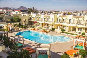 an image of a swimming pool on top of a building at Cataract Layalina Naama Bay in Sharm El Sheikh