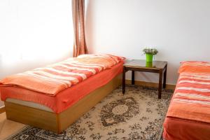 Voodi või voodid majutusasutuse Alton garni hotel toas