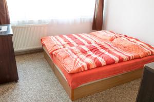Voodi või voodid majutusasutuse Alton garni hotel toas
