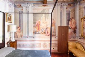 Posteľ alebo postele v izbe v ubytovaní Domus Nannini SPA - Palazzo Nannini