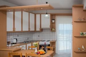 A kitchen or kitchenette at Sea Daffodil apartments