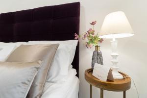 Llit o llits en una habitació de Modern Pearl in Historic setting