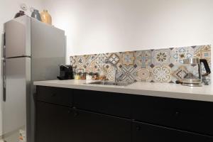 Cuina o zona de cuina de Modern Pearl in Historic setting 18 fotos més