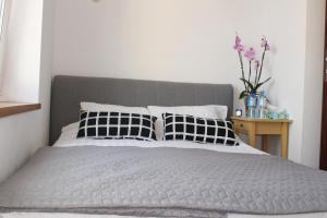 Posteľ alebo postele v izbe v ubytovaní Apartament Targ Rybny LUXON Gdansk