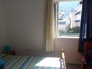 Postel nebo postele na pokoji v ubytování Anastasia - Efthimios Apartments