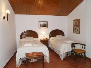 Ein Bett oder Betten in einem Zimmer der Unterkunft Fuentes de Abajo