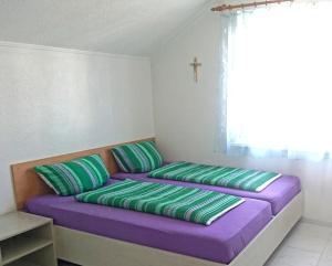 Cama o camas de una habitación en FeWo Gan