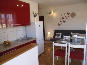 Kuchyň nebo kuchyňský kout v ubytování Apartment Vito