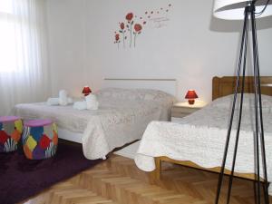 Postel nebo postele na pokoji v ubytování Apartment Vito
