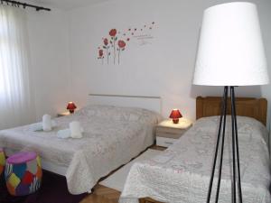 Postel nebo postele na pokoji v ubytování Apartment Vito
