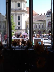 a view of a building from a window at Anna Apartman in Eger