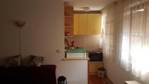 "PARADIZE" Apartmantにあるキッチンまたは簡易キッチン
