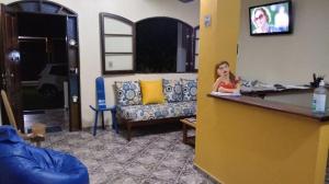 TV a/nebo společenská místnost v ubytování Pousada da Rose Paraty