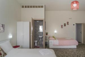 Postel nebo postele na pokoji v ubytování Aliante Turist House