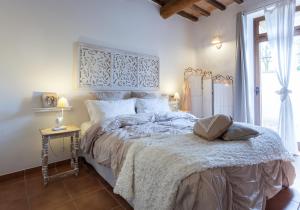 Postel nebo postele na pokoji v ubytování Le case di Lisetta Holiday homes
