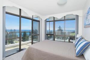 Ένα ή περισσότερα κρεβάτια σε δωμάτιο στο Tasman Towers 22, 3 Munster Street +12 φωτογραφίες