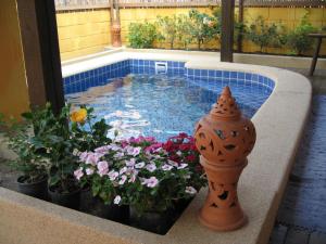 Bazén v ubytování BTC Hua Hin Home managed by BTC Boutique Resort nebo v jeho okolí