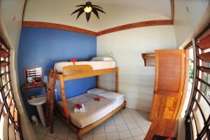 A bunk bed or bunk beds in a room at Hideaway Island Resort
