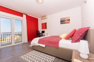 Postel nebo postele na pokoji v ubytování Apartmani Island