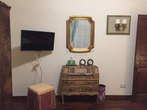 En tv och/eller ett underhållningssystem på Casa Stella