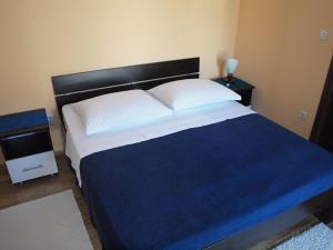 Postel nebo postele na pokoji v ubytování Apartments & Room Masa