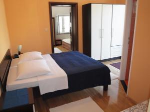 Postel nebo postele na pokoji v ubytování Apartments & Room Masa