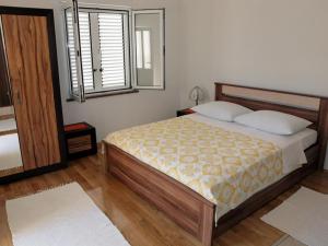 Postel nebo postele na pokoji v ubytování Apartments & Room Masa