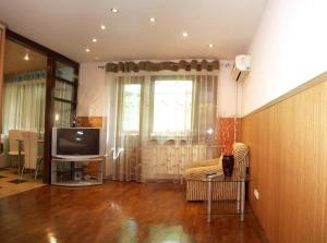 Телевизор и/или развлекательный центр в Apartment in the city center +4 фотографии