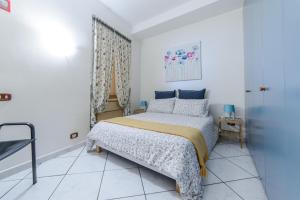 A bed or beds in a room at ALDO'S HOLIDAY HOUSE