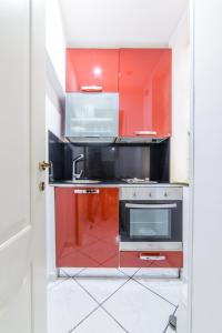 A kitchen or kitchenette at ALDO'S HOLIDAY HOUSE
